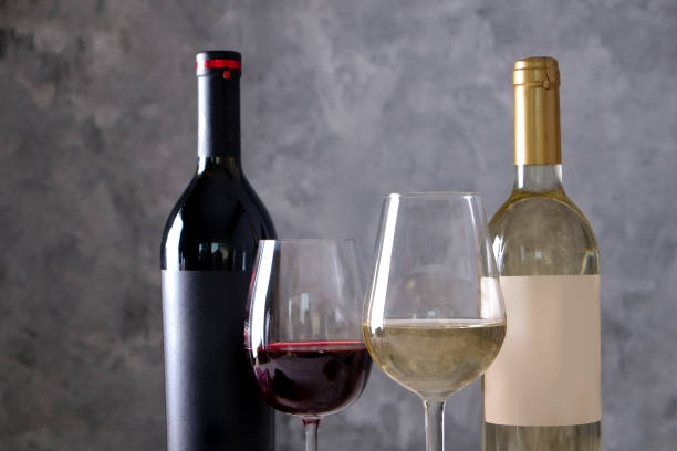 istock Showcase of vintage wine bottles with empty sticker labels. 1048204200