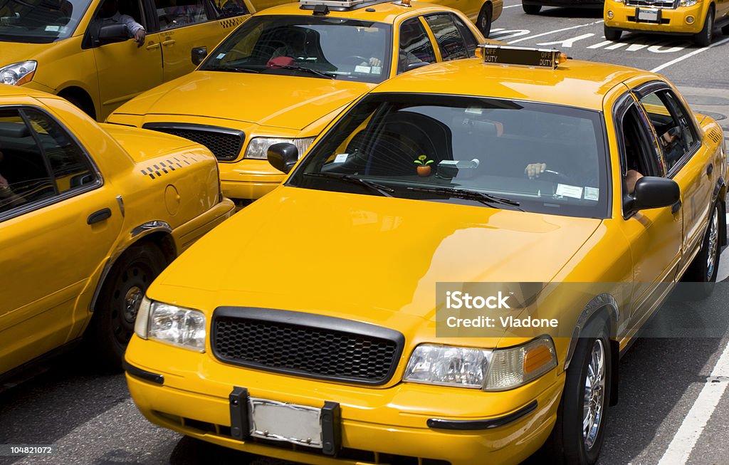 Yellow Taxi in traffic, New York City  Yellow Taxi Stock Photo