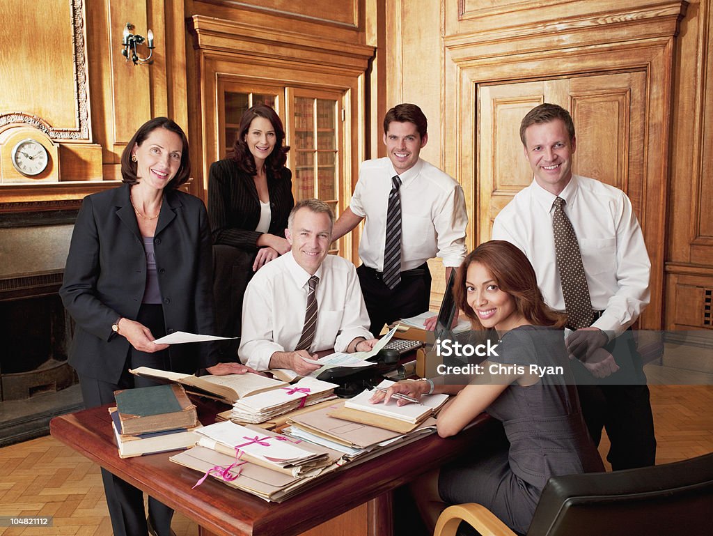 Smiling lawyers in office  Lawyer Stock Photo