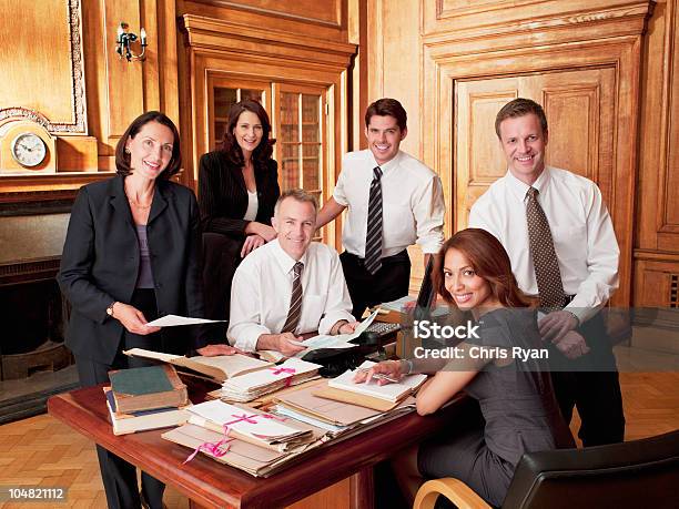 Smiling Lawyers In Office Stock Photo - Download Image Now - Lawyer, Office, Law