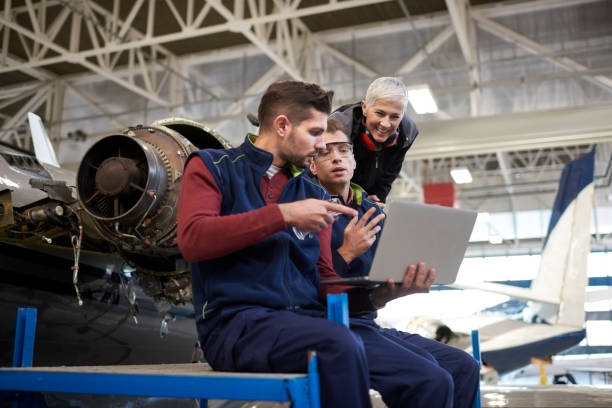 istock Aircraft mechanics in the hangar 1048211656
