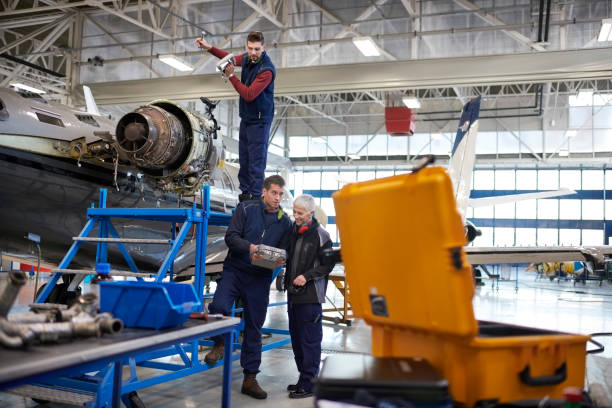 istock Aircraft mechanics in the hangar 1048211872