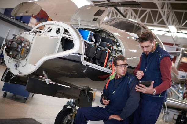 istock Aircraft mechanics in the hangar 1048212060