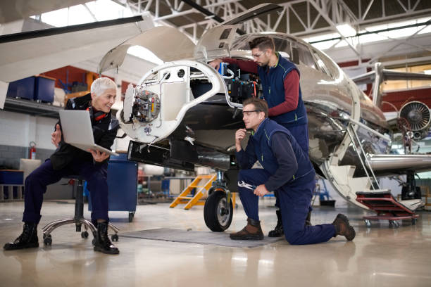 istock Aircraft mechanics in the hangar 1048212076