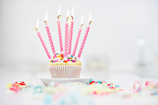 Birthday candles on cupcake  cupcake candle stock pictures, royalty-free photos & images