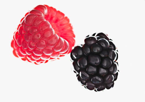 Tasty raspberry and blackberry background. Top view.