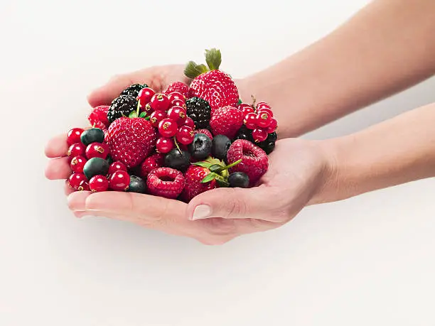 Photo of Woman holding berries