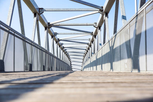 pedestrian transition over the highway . blue sky