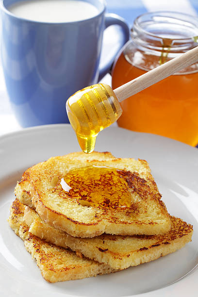 istock Toasts, honey, and milk 104823083