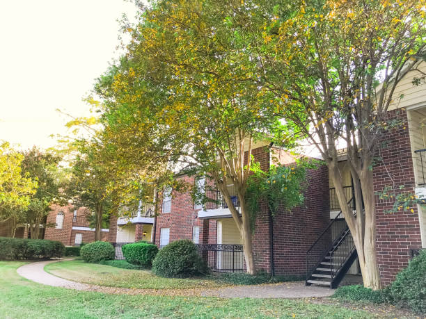 istock Typical apartment complex in suburban Dallas Fort Worth, Texas in fall season sunset 1048239440