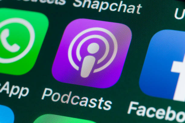 Podcasts , WhatsApp, Facebook and other Apps on iPhone screen London, UK - July 31, 2018: The buttons of the podcast app Podcasts, surrounded by WhatsApp, Facebook, Snapchat and other apps on the screen of an iPhone. britain british audio stock pictures, royalty-free photos & images