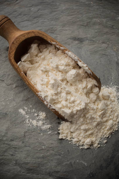 istock Bakery wooden spoon with flour 1048259438