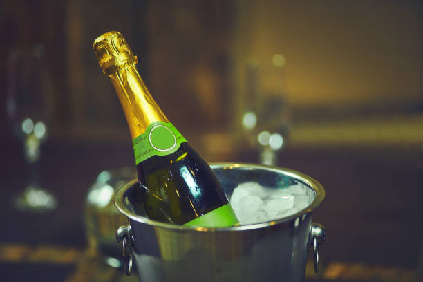 istock Emotional bartender spills champagne behind the bar 1048260052