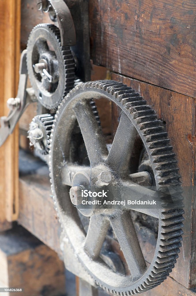 Toothed gear transmission in the old weaving loom Color Image Stock Photo