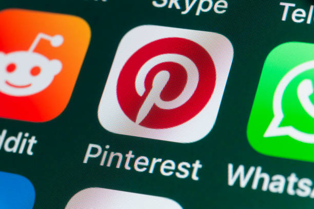 Pinterest, Reddit, Whatsapp and other Apple Apps on iPhone screen stock photo