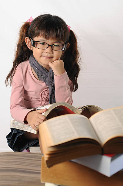 istock little girl with spectacle 104828418