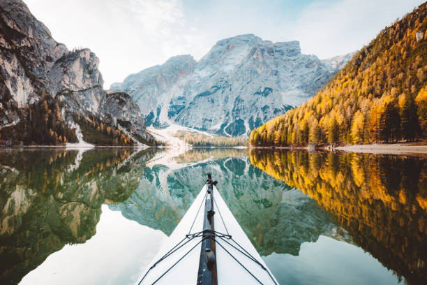 istock Kayak on a lake with mountains in the Alps 1048288736