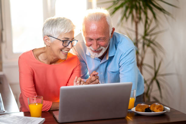 istock Senior couple using technology to keep in touch with family 1048294690