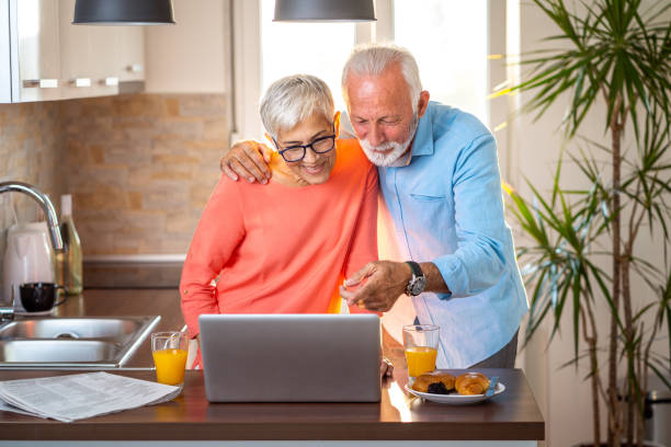 istock Senior couple using technology to keep in touch with family 1048294696