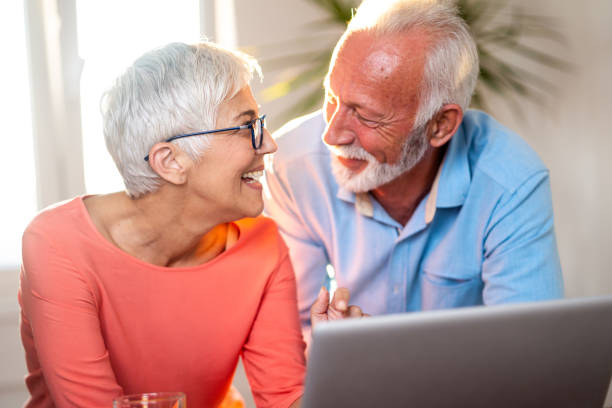 istock Senior couple using technology to keep in touch with family 1048294786