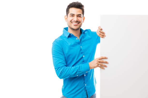 istock Man With Empty Banner Showing Concept Of Advertisement 1048300414