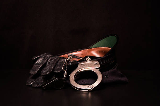 istock Police Handcuffs and Hat 1048305812
