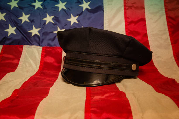 istock Police Hat on American Flag 1048306184