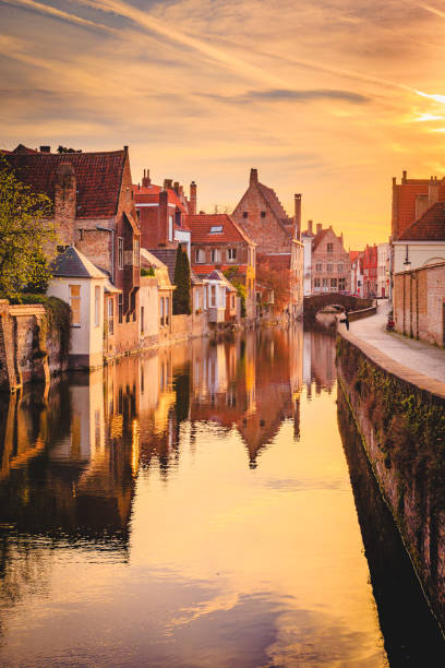 Historic city of Brugge at sunrise, Flanders, Belgium Scenic view of the historic city center of Brugge in beautiful golden morning light at sunrise, province of West Flanders, Belgium flanders belgium photos stock pictures, royalty-free photos & images