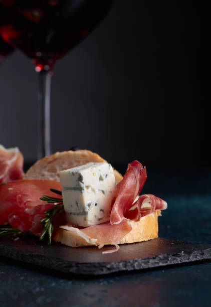 istock Sandwich with prosciutto, blue cheese and rosemary . 1048306864