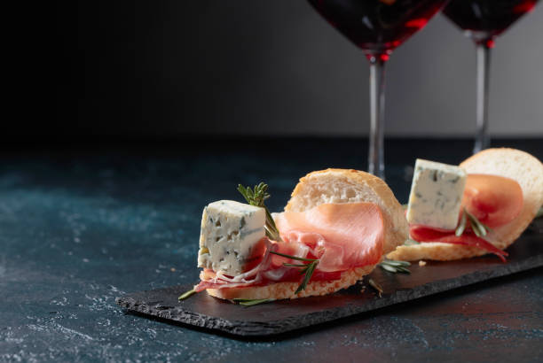 istock Sandwich with prosciutto, blue cheese and rosemary . 1048306950