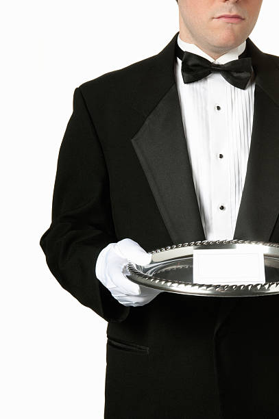 istock Man holding silver tray with blank card 104831719