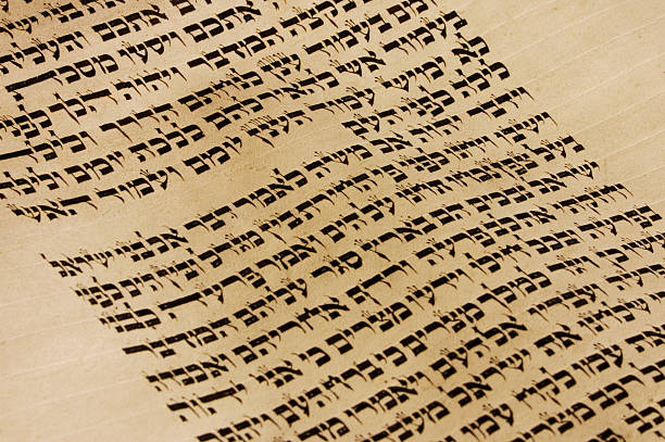 Close up view of a page of text from the Torah Passage from a Torah Scroll simchat torah photos stock pictures, royalty-free photos & images