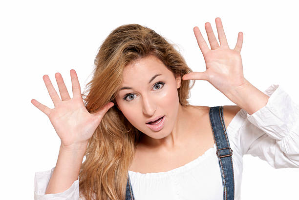 istock Young female cheerful joking with her hands isolated 104832176