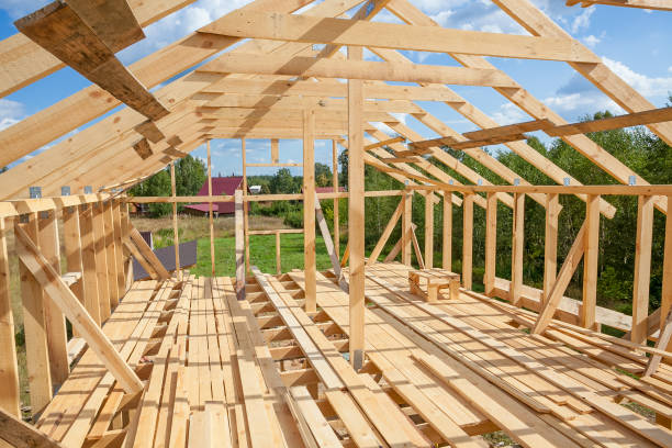 istock the construction of a village house surrounded 1048322050