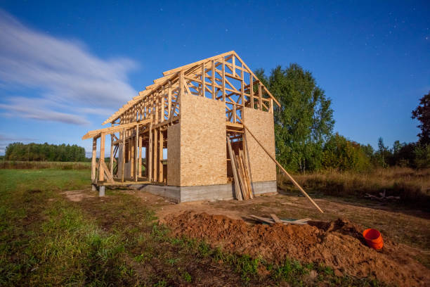 istock frame house under construction in the village 1048322302