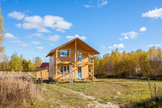 istock frame house under construction in the village 1048322588
