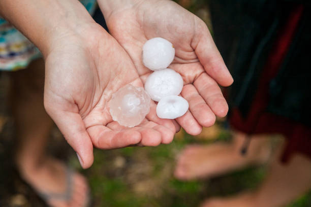 istock very large hail in the hands 1048323654
