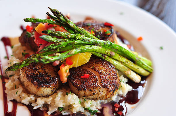 istock Plate of Scallops and Asparagus 104832584