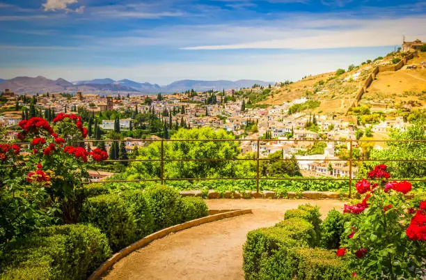 Generalife gardens and city of Granada, Andalusia, Spain, toned