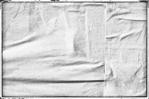 istock Blank white old ripped torn paper crumpled creased posters grunge textures backdrop backgrounds placard 1048327070