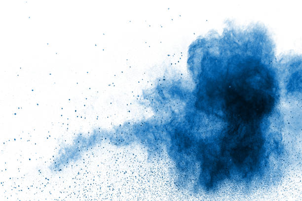 istock abstract explosion of blue dust on white background. Abstract blue powder splatter on clear  background. Freeze motion of blue powder splashing. 1048332250