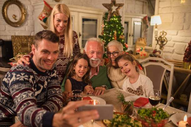 istock Family with children taking a selfie 1048335694
