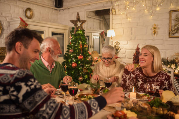 istock Family having fun at Christmas dinner 1048336644