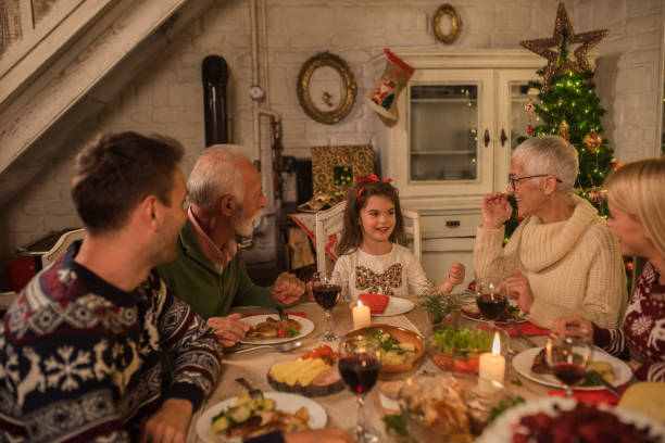 istock Family with a child at Christmas dinner 1048336884