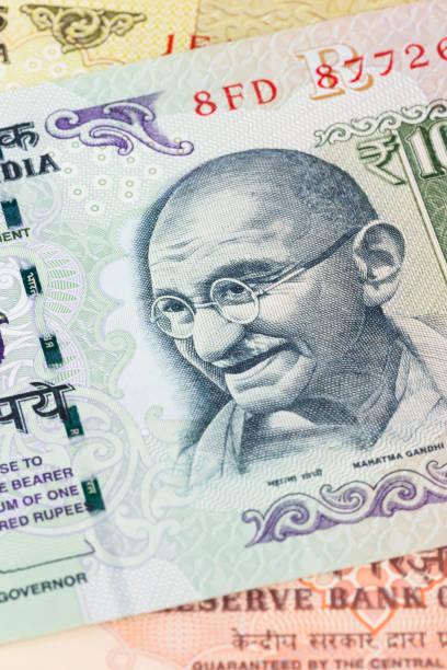 istock Gandhi on India rupee money banknote close-up 1048336972