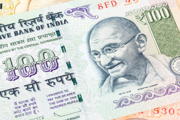 istock Gandhi on India rupee money banknote close-up 1048337010