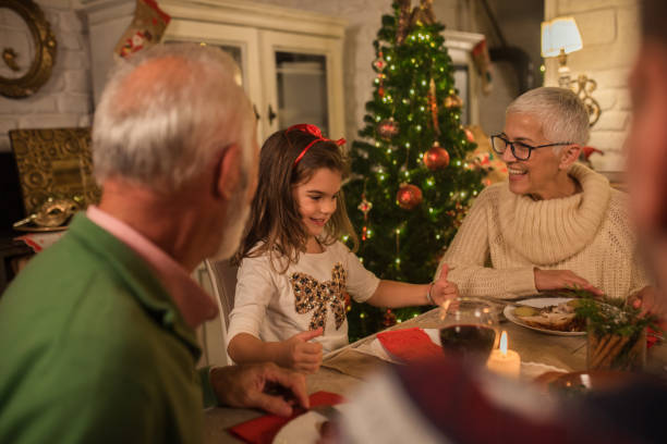 istock Young girl with grandparents 1048339176