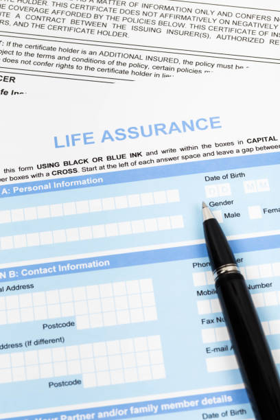 istock Life assurance application form with pen concept for life planning 1048345302