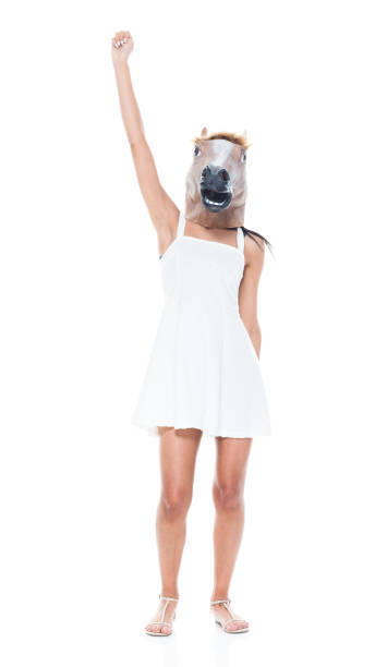 istock Cute female wearing a horse head 1048349466