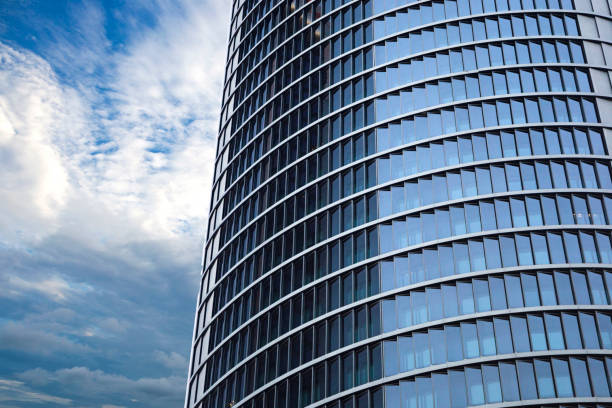 istock close up view on the modern beautiful skyscraper with gorgeous dramatic sky on the background 1048353960